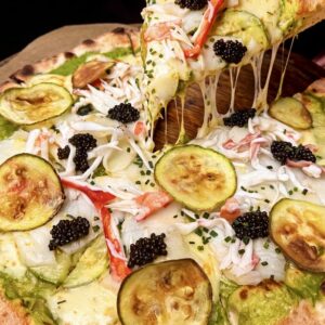 Ricco-pizza с чилийским сибасом, кабачками и черной икрой